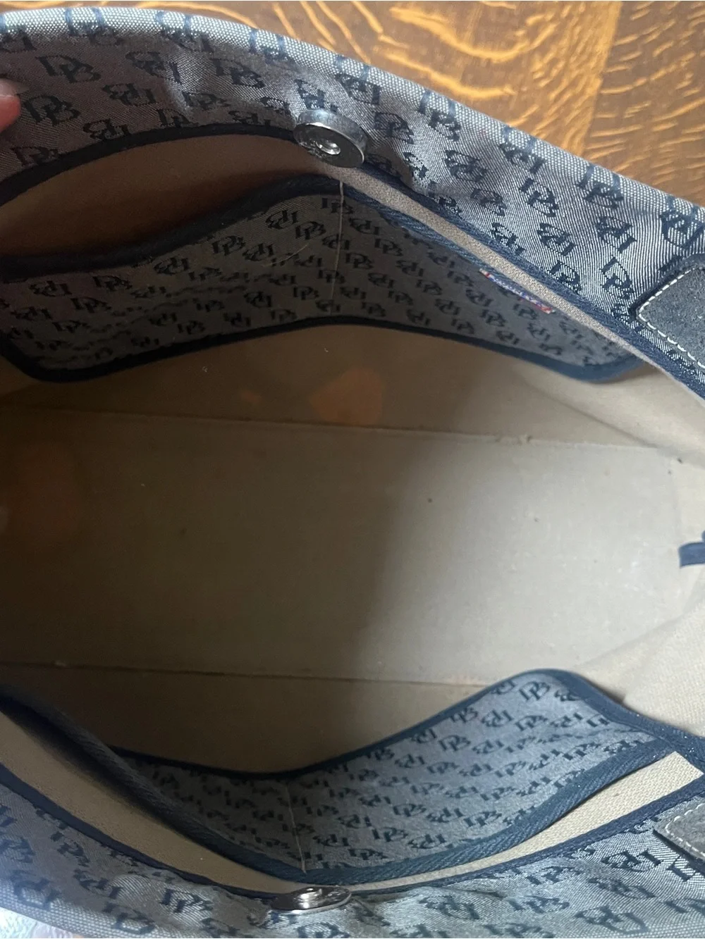 Dooney & Bourke Vintage Gray Canvas Monogram Tote with Black Trim and Tassel.